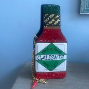 Spicy  hot sauce, bag with gold chain